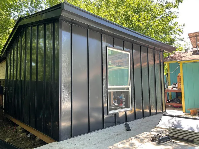 Black standing seam metal wall panels for Metal Roof Installation in Robbinsville